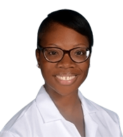 Headshot of Shonte Fraser-Damas, M.D., MHMS, M.B.A.